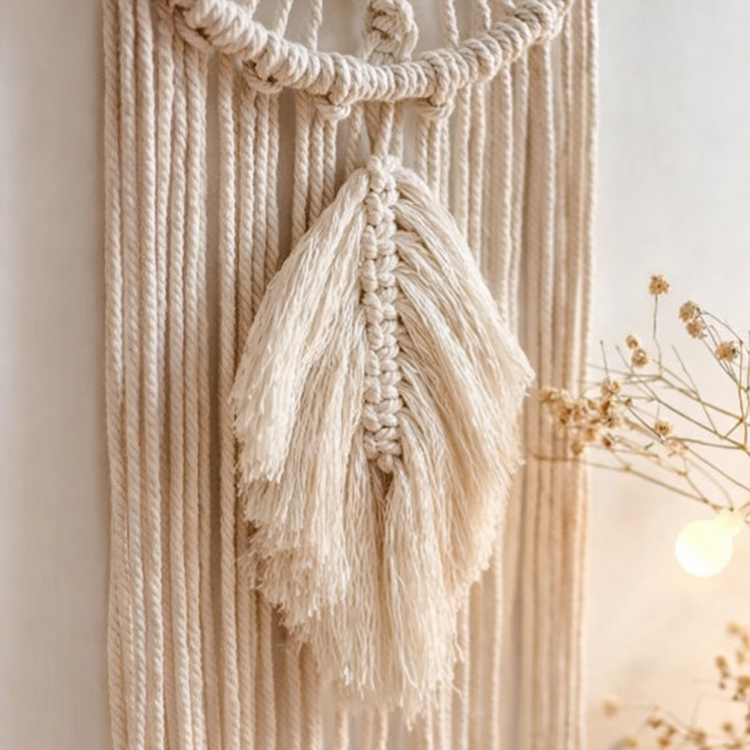 Beige macrame feather tassell wall hanging detail shot